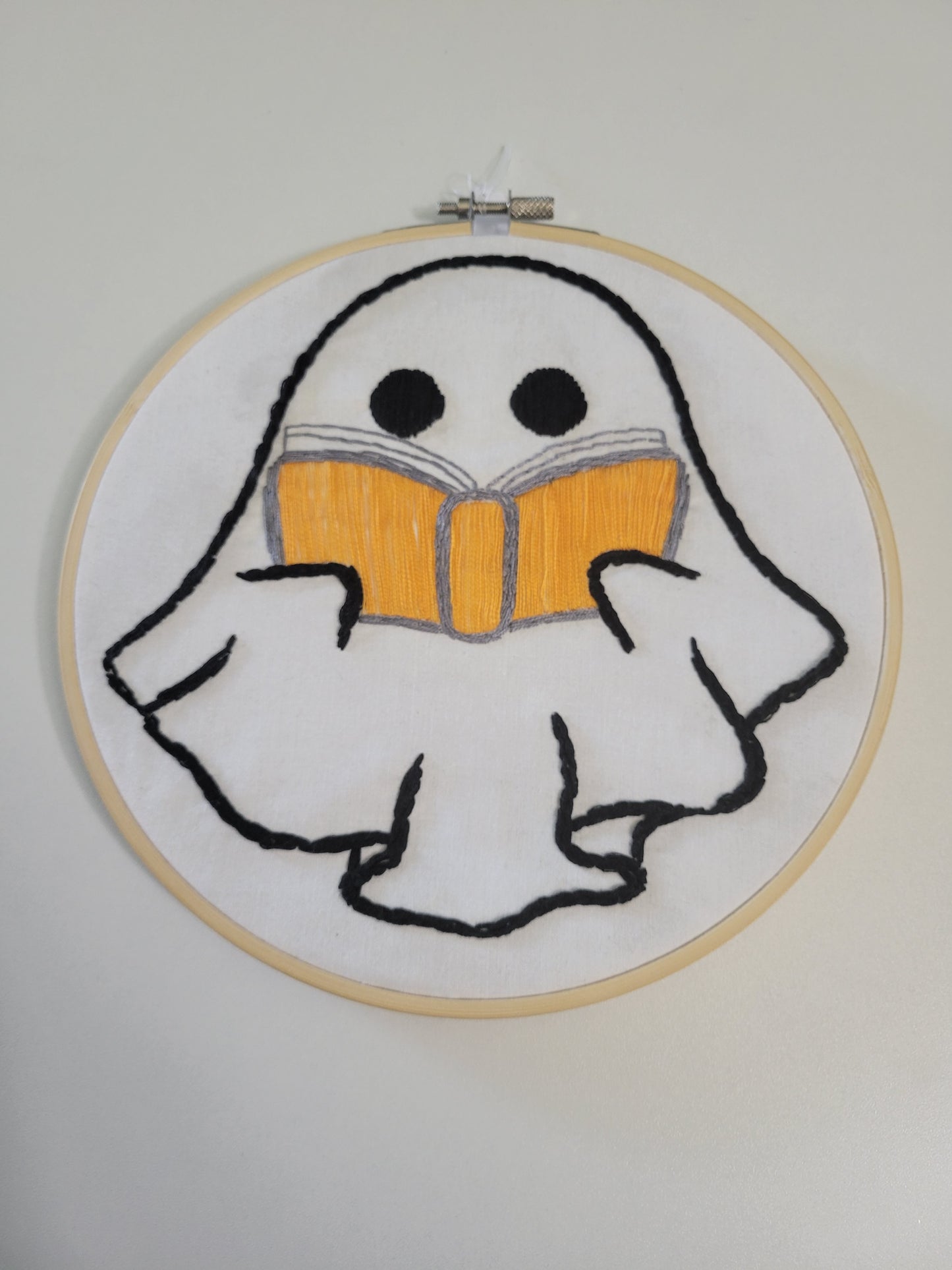 Wall hanging reading ghost